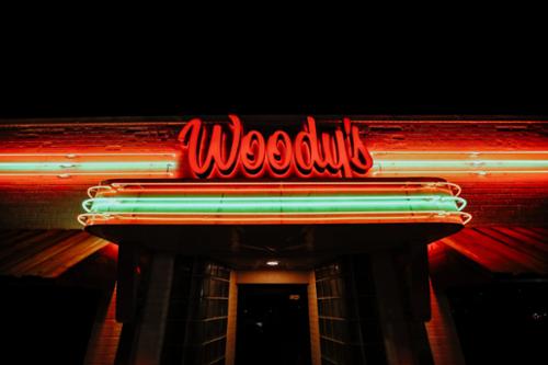 Front and back-lit channel letters, and all neon installed on building and custom awnings.