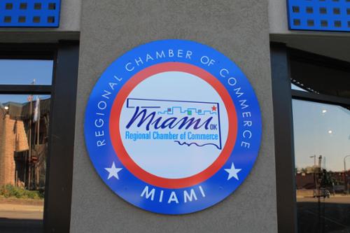 Raised ACM sign installed on stucco.