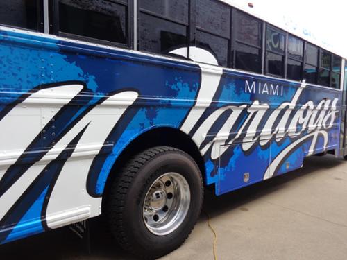 Fully designed, printed, and applied wrap to activity buses.