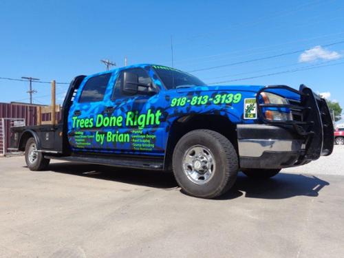 Printed and installed vinyl wrap on work truck.