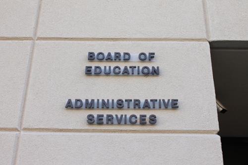 Non-lit, small channel letters installed.